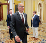 Trump delays spy nominee Clayton's  confirmation, wants voter ID law